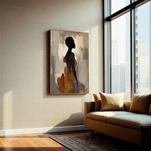 K&ouml;nnte beinhalten: Ein rechteckiges Wandbild mit der schwarzen Silhouette einer Person im Profil vor einem abstrakten Hintergrund aus strukturierten grauen, beigen und rostorangen Pinselstrichen. Das Kunstwerk ist in einem d&uuml;nnen Goldrahmen gefasst.
