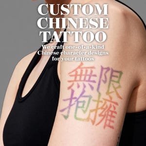 May include: A person's arm with a colorful tattoo of Chinese characters. The tattoo is in rainbow hues and reads "Infinite Embrace." The image also features the text "CUSTOM CHINESE TATTOO" and "We craft one-of-a-kind Chinese character designs for your tattoos."