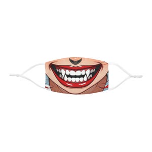 May include: A white face mask featuring a cartoon illustration of a wide, menacing grin with sharp, white teeth and bright red lips. The mask has adjustable white ear loops and a beige skin tone.