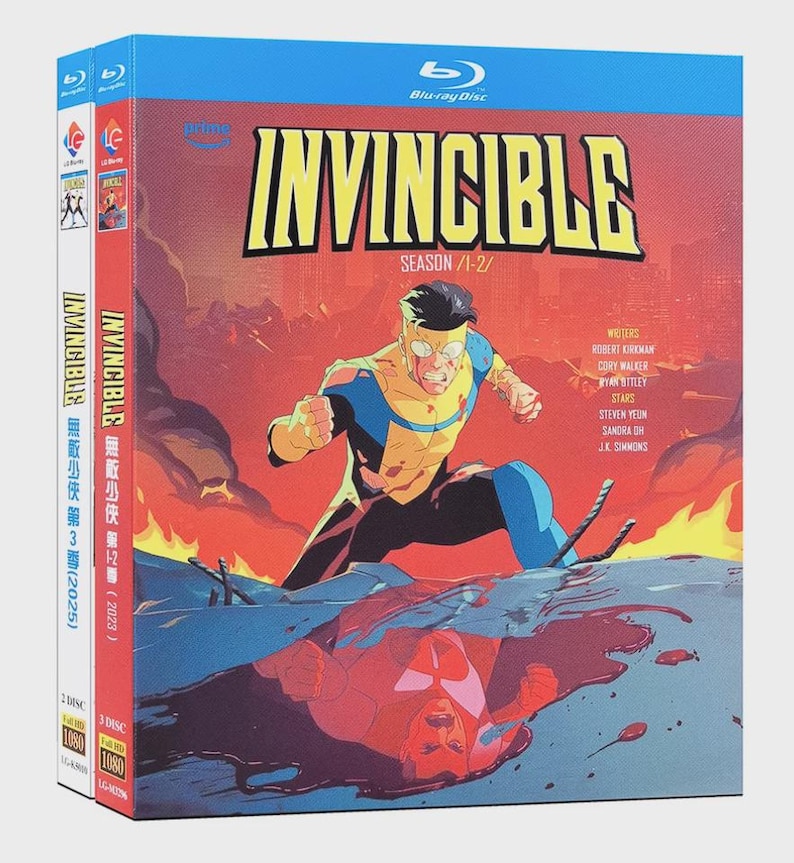 May include: Blu-ray disc set for the animated series "Invincible," seasons 1 and 2. The cover features a superhero in a yellow and blue suit against a fiery red background. The title "Invincible" is in large yellow letters.