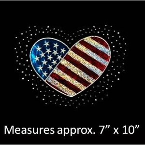 May include: A red, white, and blue American flag heart-shaped iron-on patch. It measures approximately 7 inches by 10 inches.