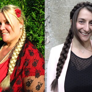 May include: Two women with long braids. The woman on the left has blonde hair with a red flower in her hair and is wearing a red and black dress with a pearl necklace. The woman on the right has brown hair and is wearing a pink blazer over a black polka dot shirt.