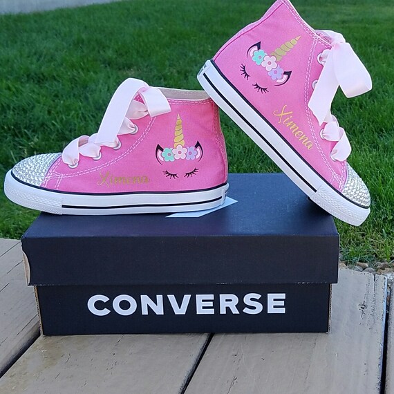 pink high top converse baby