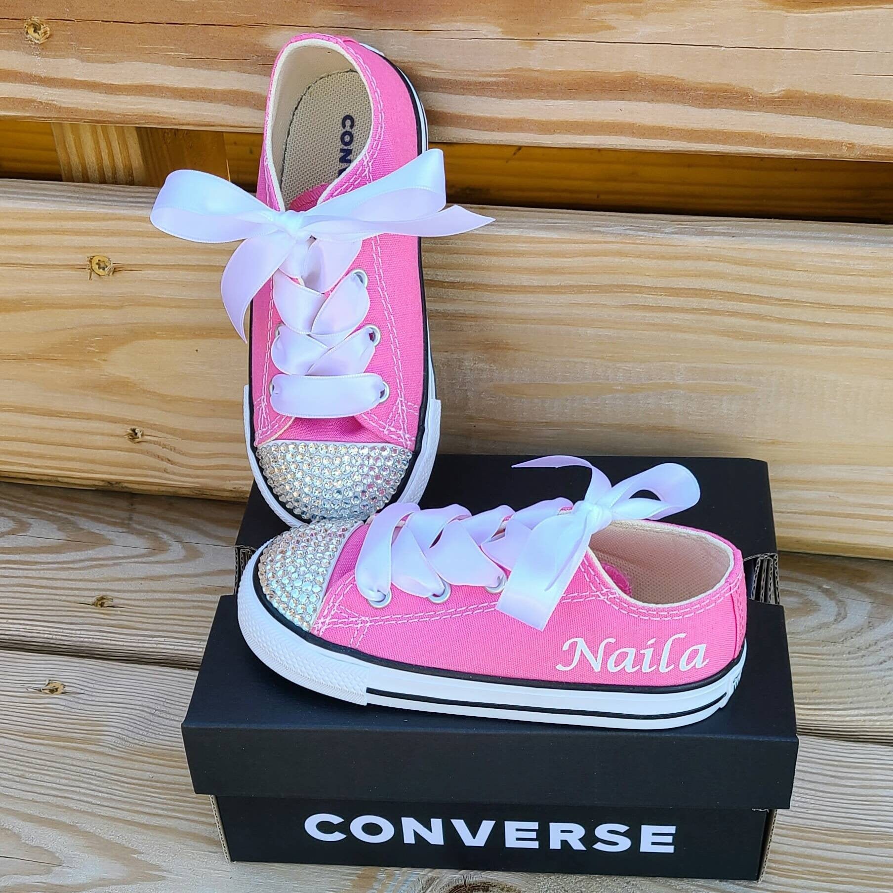 pink converse with crystals