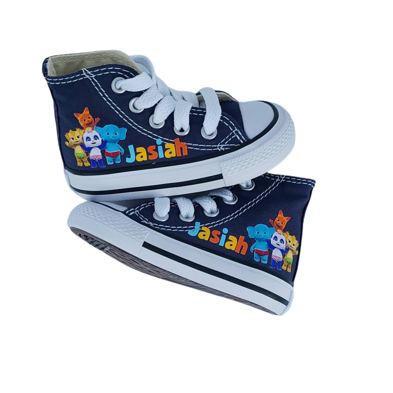 Converse with outlet words on them