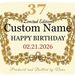 以下が含まれることがあります： クリーム色のラベルで、金色のアクセントとテキストが入っています。「37 Limited Edition Custom Name HAPPY BIRTHDAY 02.21.2026」と書かれており、ブドウの木の装飾的なボーダーが付いています。ラベルの下部には「Produced and Bottled by Name」と書かれています。
