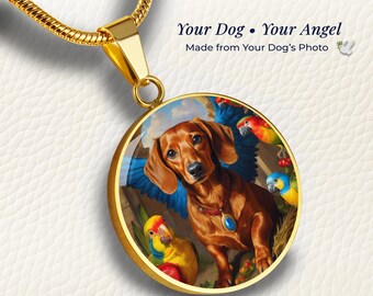 Puede incluir: Un collar con colgante circular dorado que muestra un perro salchicha marrón con alas azules, rodeado de loros coloridos. El colgante cuelga de una cadena dorada. El texto en la imagen dice: Your Dog • Your Angel, Made from Your Dog's Photo.