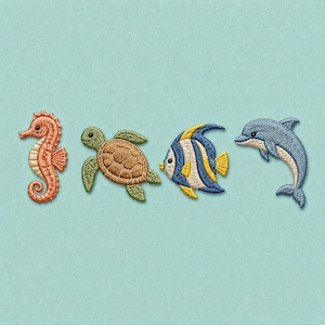 May include: A set of four embroidered fabric patches featuring marine life: an orange seahorse, a green and brown sea turtle, a blue, yellow, and white tropical fish, and a grey dolphin, all arranged in a horizontal row on a light blue background.