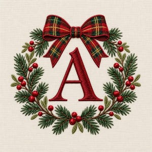 May include: An embroidered design featuring a large, dark red letter A centered within a circular wreath of green pine needles and small red berries. A prominent red, green, and yellow plaid bow sits at the top of the wreath on a cream fabric.
