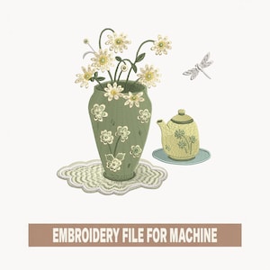 May include: An embroidered design featuring a green vase with white flowers, a yellow teapot, and a dragonfly. The vase sits on a decorative doily. The text "EMBROIDERY FILE FOR MACHINE" is at the bottom. This design is suitable for machine embroidery projects.