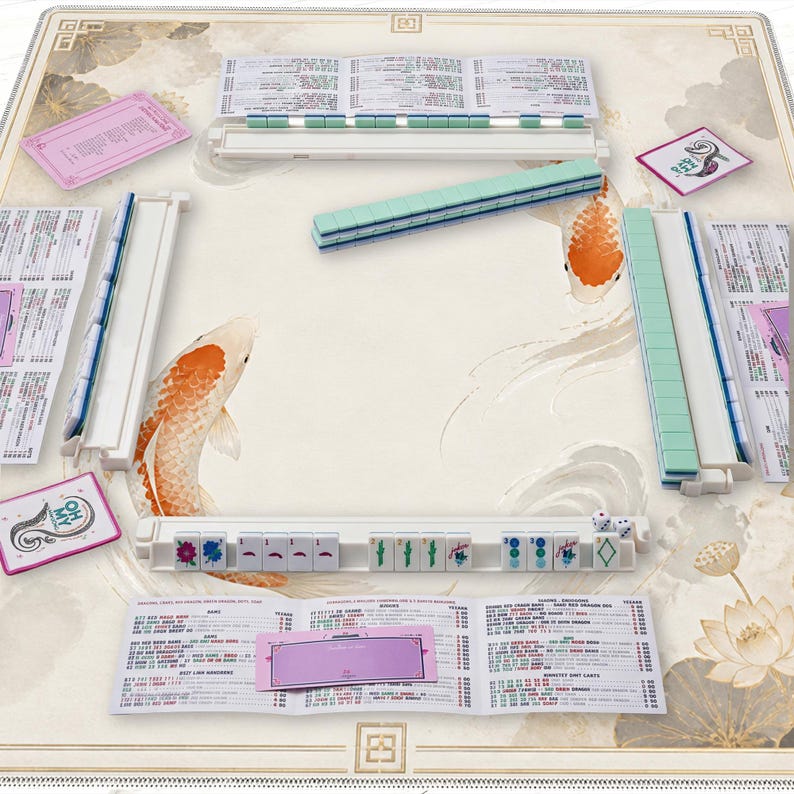 May include: A complete Mahjong set with a cream-colored playing surface featuring koi fish illustrations. The set includes tiles, racks, dice, and score cards. The tiles are white with black symbols and green accents. The set is ready for play.