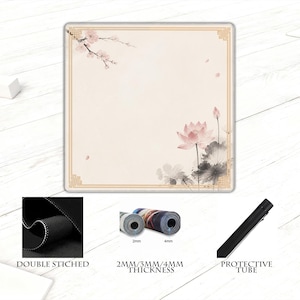 May include: A square mousepad with a floral design featuring a pink lotus flower and cherry blossoms. The mousepad has a gold border and the text "DOUBLE STICHED", "2MM/3MM/4MM THICKNESS", and "PROTECTIVE TUBE".