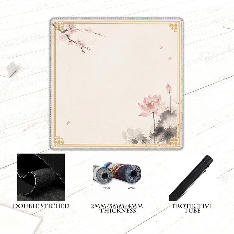 May include: A square mousepad with a floral design featuring a pink lotus flower and cherry blossoms. The mousepad has a gold border and the text "DOUBLE STICHED", "2MM/3MM/4MM THICKNESS", and "PROTECTIVE TUBE".