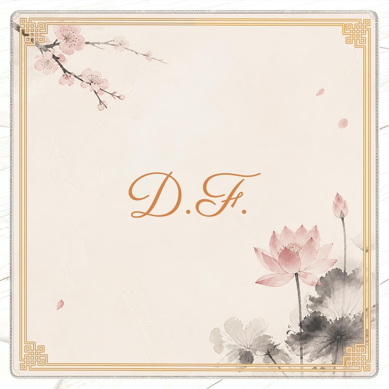 May include: A square card with a cream background, featuring a gold border and floral illustrations. The design includes a lotus flower, cherry blossoms, and the initials "D.F." in a copper-colored script. The overall aesthetic is delicate and artistic.