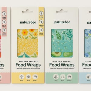 May include: Four packages of reusable beeswax food wraps with colorful patterns. Designs include strawberries, flowers, leaves, and blueberries. Each package contains three wraps in different sizes. The brand name "naturebee" is printed on each package.