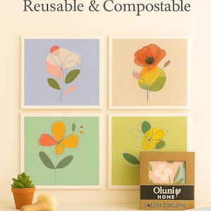 May include: Four square art prints with floral designs in pastel colors. The prints are displayed on a light background. A small potted succulent and a wooden brush are on the left. A box of Swedish dishcloths is on the right. The text "Oluni Home Reusable & Compostable" is at the top.