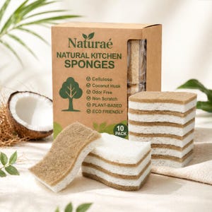 May include: A box of Naturae Natural Kitchen Sponges with a coconut half in the background. The box features a tree logo and the words "Cellulose, Coconut Husk, Odor Free, Non Scratch, Plant-Based, and Eco Friendly." Several sponges are stacked and displayed.