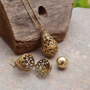 Gold Harmony Bola: Pregnancy Chime Pendant