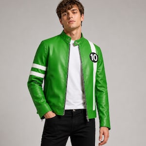 Young male model wearing a bright green leather jacket with white stripe details, number 10 chest patch, stand collar, open front zipper, white inner shirt, and black pants. Stylish fashion pose on a light grey studio background, showcasing a sporty racing inspired leather jacket for men.