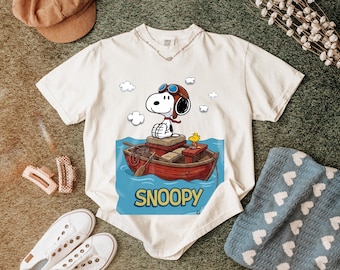 Camiseta de Snoopy en bote, camiseta con estampado de dibujos animados de Peanuts, ropa para amantes de los perros.