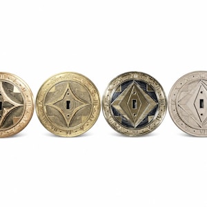 May include: Four circular light switch plates arranged in a row, each featuring a central diamond-shaped cutout and a border marked with Roman numerals. The plates are finished in varying metallic tones including brass, gold, dark bronze, and silver.