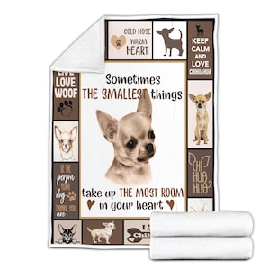May include: A white blanket featuring a Chihuahua dog design. The blanket includes text that reads "Sometimes the smallest things take up the most room in your heart." Additional text includes "Cold Nose Warm Heart" and "Keep Calm and Love Chihuahua."