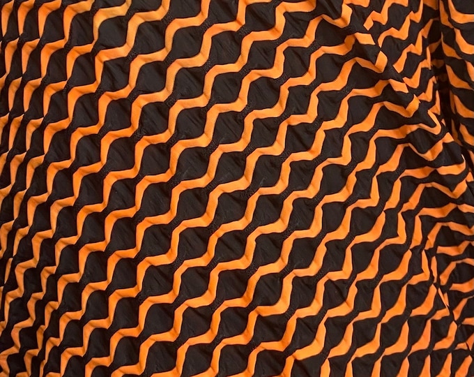 Orange geometric spandex 4-way stretch 58/60” Sold by the YD