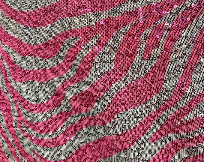 Pink zebra stretch lace with sequins all around white base 58” wide