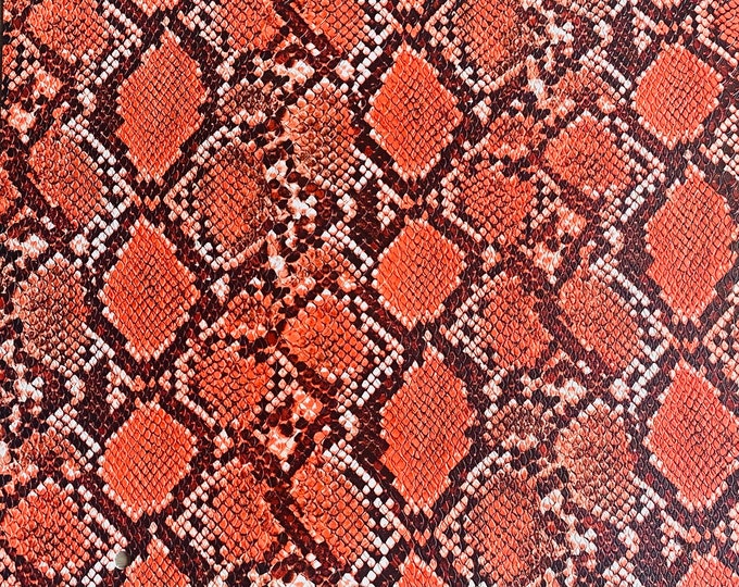 Orange Cobra Snake Embossed vinyl fabric sold by the yard 54” wide