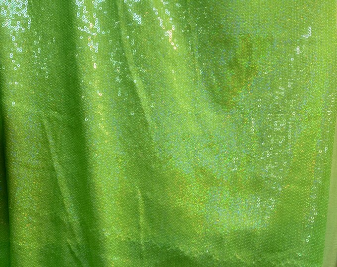 Lime sequins embroidered glitz on stretch polyester spandex base 2-way 58/60” wide