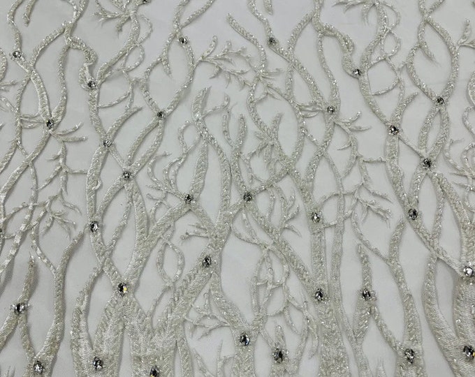 Off White Vine with heavy beading on a mesh lace-sold by the yard.