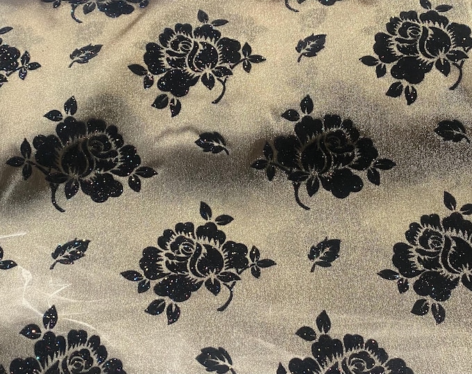 Organza Black floral flocking on dark gold sparkling  fabric 45” wide