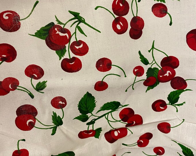 Poly cotton Red cherry’s on white fabric sold  by yard  58" wide