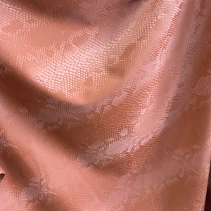 Rust matte stretch vinyl fabric costumes, leggings, clothing  Sold by the Yard.