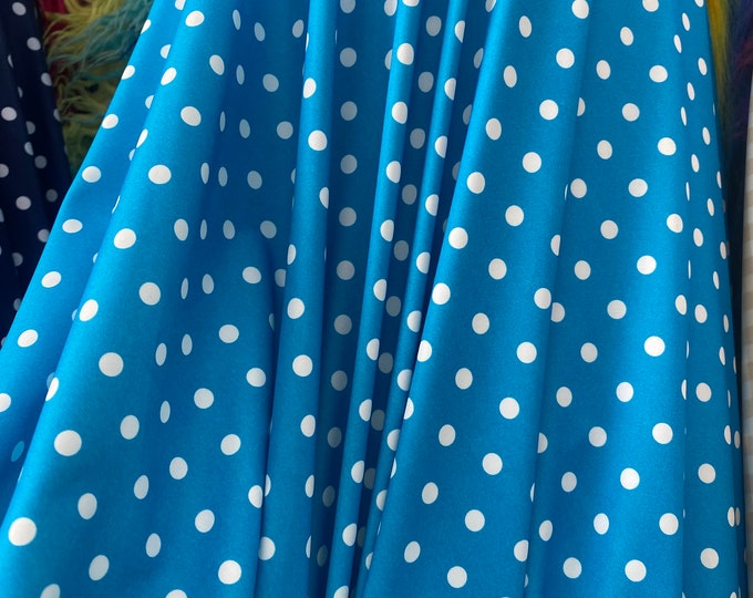 White polka dot on blue 4 way stretch spandex fabric,  SOLD BY YARD 60 inches wide