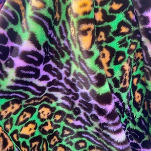 Purple / Green Multi colored Leopard Spotted shaggy short pile faux fur fabric by the yard