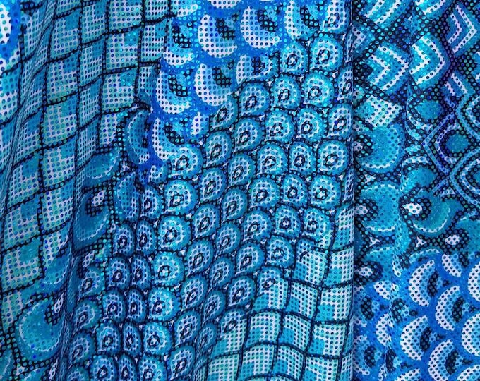 Turquoise Abstract peacock Nylon Spandex print fabric. Great for Dancewear, costumes, leggings. Sold by the Yard.