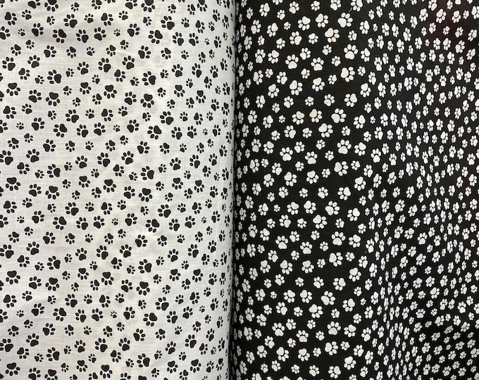 Small dog paws print poly cotton, no stretch, 60" wide, non-stretch, sells by the yard