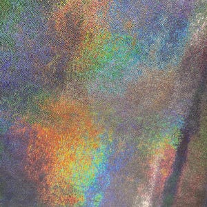 Silver /black iridescent foggy foil on 4 way stretch velvet fabric sold by the yard