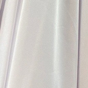 May include: A close-up view of a draped, light lavender fabric. The fabric has a soft sheen and subtle texture, with vertical folds creating shadows and highlights. The material appears lightweight and flowing.