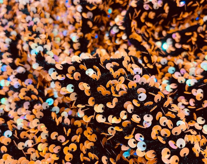 Orange Iridescent On Black stretch velvet  2-way stretch, sold by the yard