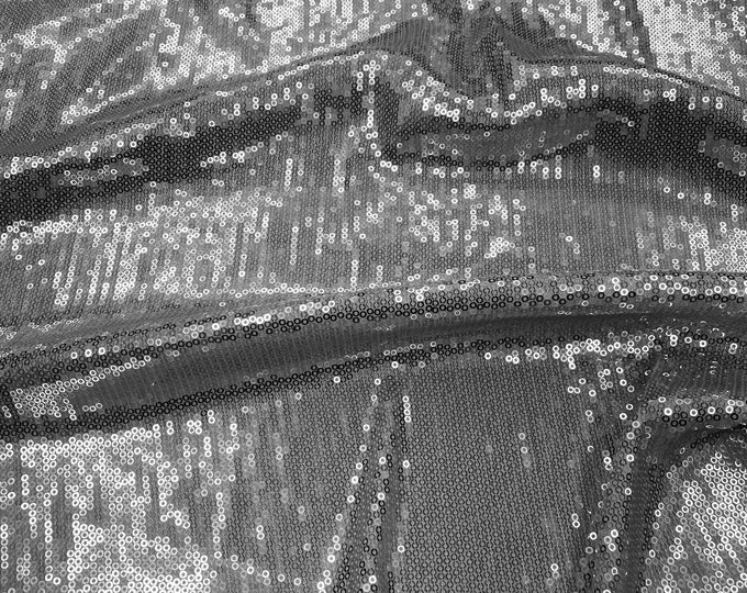 Silver sequins embroidered glitz on stretch polyester spandex base 2-way 58/60” wide