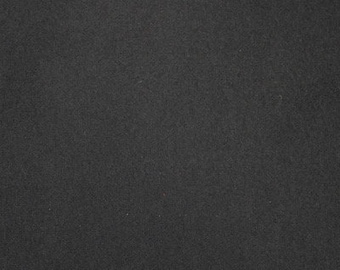 May include: A solid black fabric with a subtle texture.