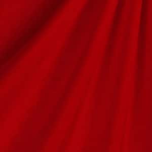 May include: A close-up of a vibrant red fabric with soft folds and shadows. The material appears to be flowing, creating a sense of movement and depth. The rich color suggests a luxurious textile.