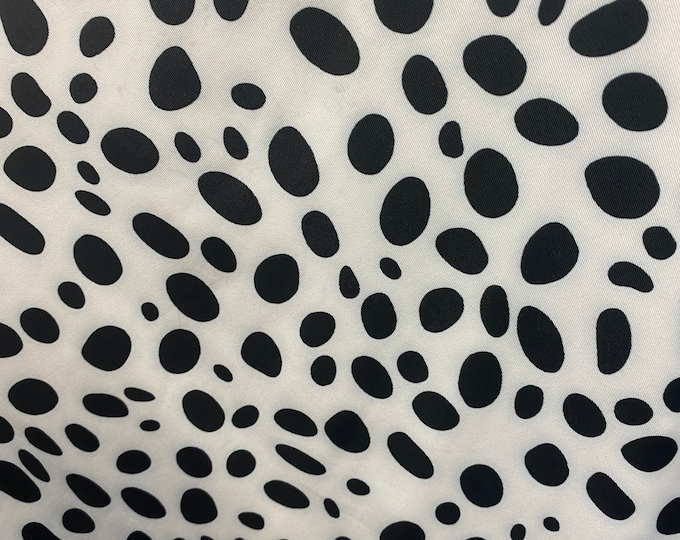4 way stretch Dalmatian black/ on white  spandex fabric 60 inches wide