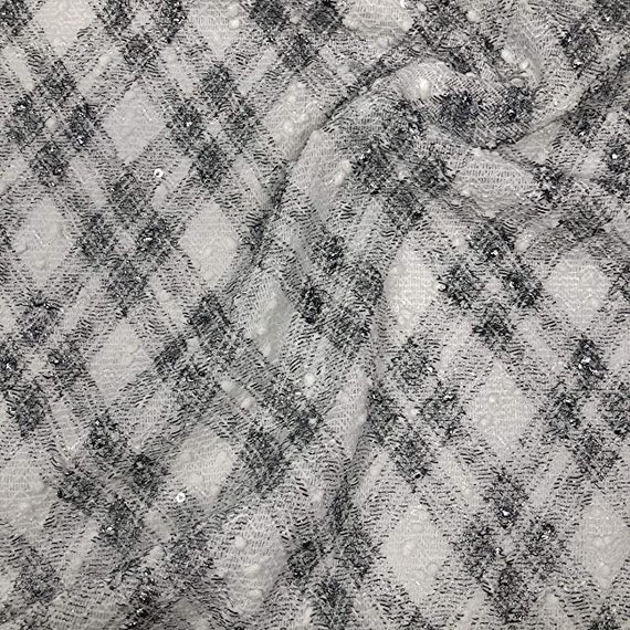 Metallic sweater knit fabric deals