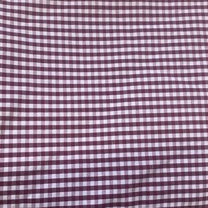 May include: A white and burgundy gingham fabric with a small check pattern.