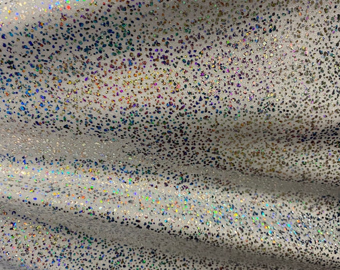 White hologram pebbles design hologram metallic nylon spandex 4-way Stretch 58/60” Sold by the YD