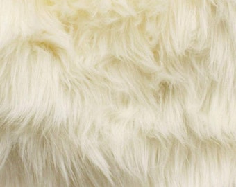 Ivory shaggy faux fur upholstery fabric  yard 60" wide