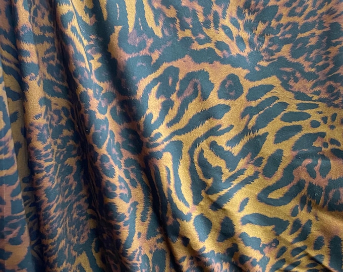 Brown leopard  nylon spandex iridescent foil 4way 58/60"